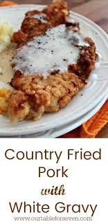 Step 2 dredge each piece of pork cube steak in flour, and then transfer them into the skillet. Country Fried Pork With White Gravy From Table For Seven