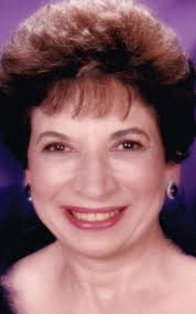 Lucy D. Savini, 80; nurse continued to serve in retirement