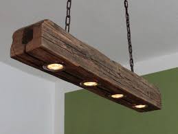 Zimmerdecke komplett aus holz oder nur mit stabilen holzbalken fügen einen. Deckenlampe Aus Altem Holzbalk Rustic Light Fixtures Wood Light Fixture Rustic Lighting