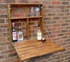 Use a tape measure to determine the overall dimensions of your mini fridge, as it will affect the bar's overall design. Garden Mini Bar Ideas