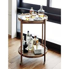 11 Handsome Bar Carts That Will Keep The Party Rolling Gold Bar Cart Round Bar Cart Bar Cart Decor