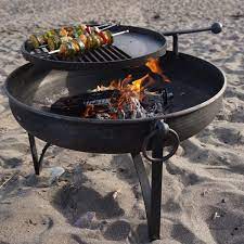My personal favorite fire pit cooking accessory is the over fire grill (also known as a height adjustable fire pit cooking grate). Plain Jane Firepit Bbq Swing Arm Bbq S Firepits Outdoor Fires Fireside Accessories West Country Stoves