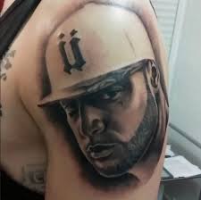 Why do rappers get face tattoos? 15 Fanatiques Qui Se Sont Fait Tatouer Du Booba Photos