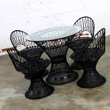 Fiberbuilt patio umbrella 7 1/2 foot hexagon with two piece aluminum pole and spun acrylic canopy, 15 lbs. Russell Woodard Spun Fiberglass Patio Table And Four Chairs In Black Warehouse 414