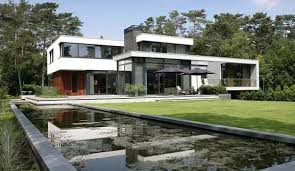 Pequeña y moderna casa de estilo japonés donde incluimos la fachada y los planos, diseño de interiores con techos a doble altura de vivienda oriental. Constructoravalleandino Cl Construyendo Suenos Constructoravalleandino Cl