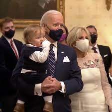 President joe biden holds his grandson beau biden at the white house on january 20, 2021 in washington, d.c. President Joe Biden Is Here To Remind You He S Also The Cutest Grandpa Glamour