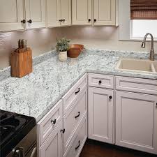 A stunning white ice granite kitchen island. Hampton Bay 4 1 2 In X 25 3 4 In Laminate Endsplash Kit In White Ice Granite With Eased Edge 016949119999476 The Home Depot