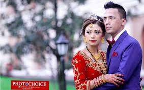 The bride wears a new sari. Wedding Photography Services In Kathmandu Best Photographer Of Nepal