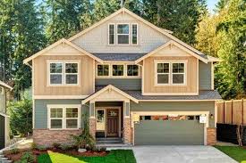 Siding Brick And Shingles In Warm Hues Create A Memorable Look The Baker B Model Built By Pacific Ridge Homes Exterior Remodel Building A House House Design