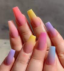 We Ve Rounded Up New Nail Polish Colors That Will Vibes Right At Home At One Of Our Favorite Beaches These Multicolored Nails Ombre Nails Coffin Nails Designs