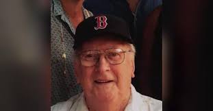 John E. Colfer Obituary