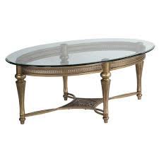 Glass tops are all the rage these days. Magnussen Galloway Antique Oval Cocktail Table With Glass Top 37526x Kit