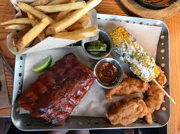 In a medium bowl, combine corn kernels, mayonnaise, sour cream, lime juice, chili powder and cayenne. Yummy Corn On The Cob Picture Of Chili S Grill Bar Sandy Tripadvisor