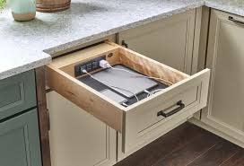 Is there a way to convert the false front drawers. Yorktowne Cabinetry Charging Drawer