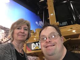 It's Caterpillar Manufacturing Day at the Caterpillar Visitor Center.  Executive Director Patti Gratton and Steve are there to greet visitors  along with board member Jennifer Wick.