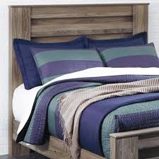 It's got the crisp, clean lines of a contemporary piece, but with softly weathered elements, including antiqued industrial pulls and an. Signature Design By Ashley Zelen Full Panel Headboard In Warm Gray Nebraska Furniture Mart