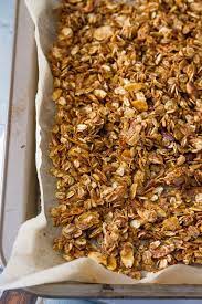 Freshly Made Homemade Granola Recipe Still In The Rimmed Baking Sheet With The Parchment Paper Granola Recipe Homemade Homemade Granola Snacks