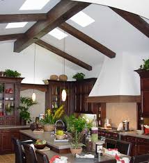 A very popular ceiling enhancement is including exposed wood beams or even faux wood beams. Vaulted Ceilings With Exposed Beams Barron Designs