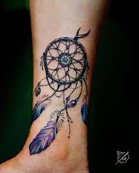 Color on dreamcatcher tattoos is such a great touch. Pin On Nancy S Tattoo Ideas