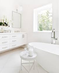 White bathrooms are classic, but going with a monochromatic palette can get dull, fast. White And Silver Master Bathroom Colors Transitional Bathroom
