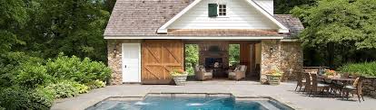 Pool house designs can be as simple as a timber structure that's suitable for storage and a small changing area, right up to a grand design that has floor to ceiling windows, a wet bar and kitchen area. Custom Pool Houses Design And Installation Long Island