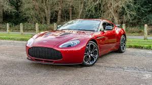 Image result for Magma Red 2012 Aston Martin