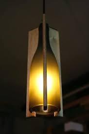 Hanging glass bottle lights in jus 5 mins. Recycled Wine Bottle Hanging Light Recyclart