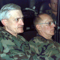 US Army Major General Walter Yates, Deputy Commander United States Army,  Europe (left), and US Army Major General Leslie Burger, Deputy Director  Medical Readiness, Joint STAFF (right), sit in a Tactical Operation