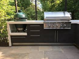 The sleek black cabinet body and stainless steel door with a recessed handle make this unit a stylish addition to any space. Garden Living Outdoor Kitchens Great Outdoor Kitchen Ideas