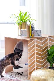 Using real tree branches, plywood, stones, rope, and faux greenery, your indoor kitty will love their new cat tower. Patterned Diy Litter Box Cover Sugar Cloth Diy Home Decor