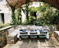 En Plein Air Inspired By A Pergola Seen Chez Marella Agnelli A Split Reed Structure Covered In Jasmine And Wiste Outdoor Dining Outdoor Rooms Outdoor Living