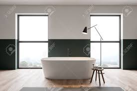 Bathroom green walls grey floor. Interior Of Stylish Bathroom With White And Green Walls Wooden Floor And White Bathtub Standing Between Windows 3d Rendering Stock Photo Picture And Royalty Free Image Image 124086170