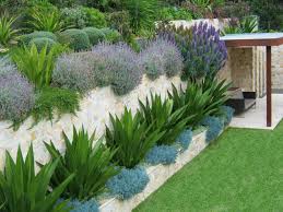 Limestone Feature Walls For A Breezy Garden Eco Outdoor Landscaping Retaining Walls Backyard Garden Design Garden Retaining Wall