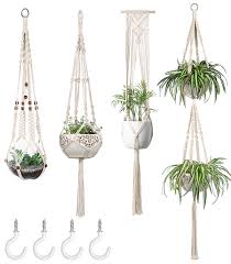 English ivy is a common plant you'll normally see covering stone or brick walls on building exteriors. Mkono Macrame Plant Hangers Set Of 4 Indoor Wall Hanging Planter Basket Decorative Flower Pot Holder With 4 Hooks For Indoor Outdoor Home Decor Gift Box Medium Buy Online In Bahamas At