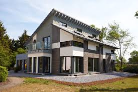 Die Perfekte Flexibilitat Fur Wohnen Und Arbeiten Das Haus Bietet Ein Bis Zwei Wohneinheiten Im Anbau Findet Das Home Office Platz Okal Haus Haus Musterhaus