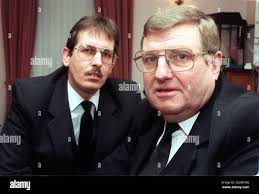 Undertaker Ken Davison (right) tells how he witnessed a miracle as a body  came back to life in Hinchingbrooke Hospital's mortuary. Mr Davison,  pictured with fellow undertaker Gary Morris, at his offices
