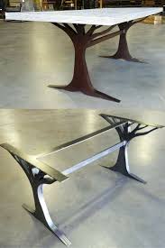 What An Interesting Custom Table Leg Base Made From Metal Love The Tree Chair Selection For The Table Custom Table Legs Metal Table Base Metal Table Legs