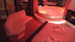 Our Essence Suite With Loveseat Has A 77 Gallon Whirlpool Tub Fireplace King Size Bed Marble Steam Room With Rain Fore Love Seat Park Hotel Leather Loveseat