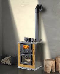 Cuisiniere A Bois Encastrable En Fonte Ceramique Corinne Cola Gf Warmetechnik Wood Stove Stove Heater Wood