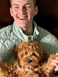 My son with our new puppy this morning!!