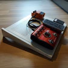 That was where i wanted to somehow put the electrical strip and extra. A Metal Shelf That S Perfect As A Guitar Pedalboard Ikea Hackers