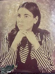 Hi group, would it be possible for any of you to help me please "clean" my  mom's pic? It was taken