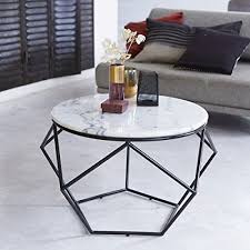 If you have a material of choice, look through a wide range of tables in different materials like marble, glass, wood, and metal. Round White Marble And Metal Coffee Table Buy Online In Andorra At Andorra Desertcart Com Productid 60353212