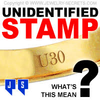 But did you check ebay? Unidentified Stamps Inside Rings Jewelry Secrets