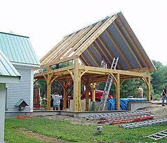 Oak car port in dordogne oak timber framing & carpentry. Shelter Institute Hennin Timber Frame Kits