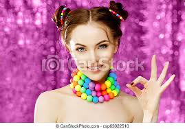 List of candydoll models | movies and photosets | uploads every day. A Bright Woman Model Shows Okay Hand Fingers Beautiful Stylish Young Woman In A Candy Doll Style With Massive Beads Canstock