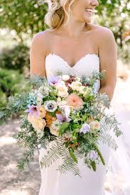 Traditional wedding wisdom says that blue is the requisite good luck shade for brides. June Wedding Flowers In Season Wedding Flowers