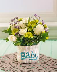 A thoughtful gift for busy new mums and dads, our new baby flowers are a gorgeous way to welcome a little bundle of joy into the world! Welcome Baby Boy Arrangement New Baby Flower Arrangements Gifts Netflorist
