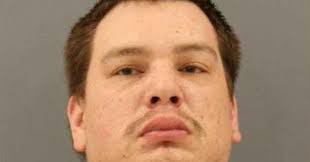 Charges: Motorist with stolen gun randomly fires at another vehicle