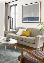 With A Pattern Reminiscent Of Persian Rugs From The 18th Century Our Sivas Rug Features A Timeles Modern Furniture Living Room Chair And Ottoman Leather Chair